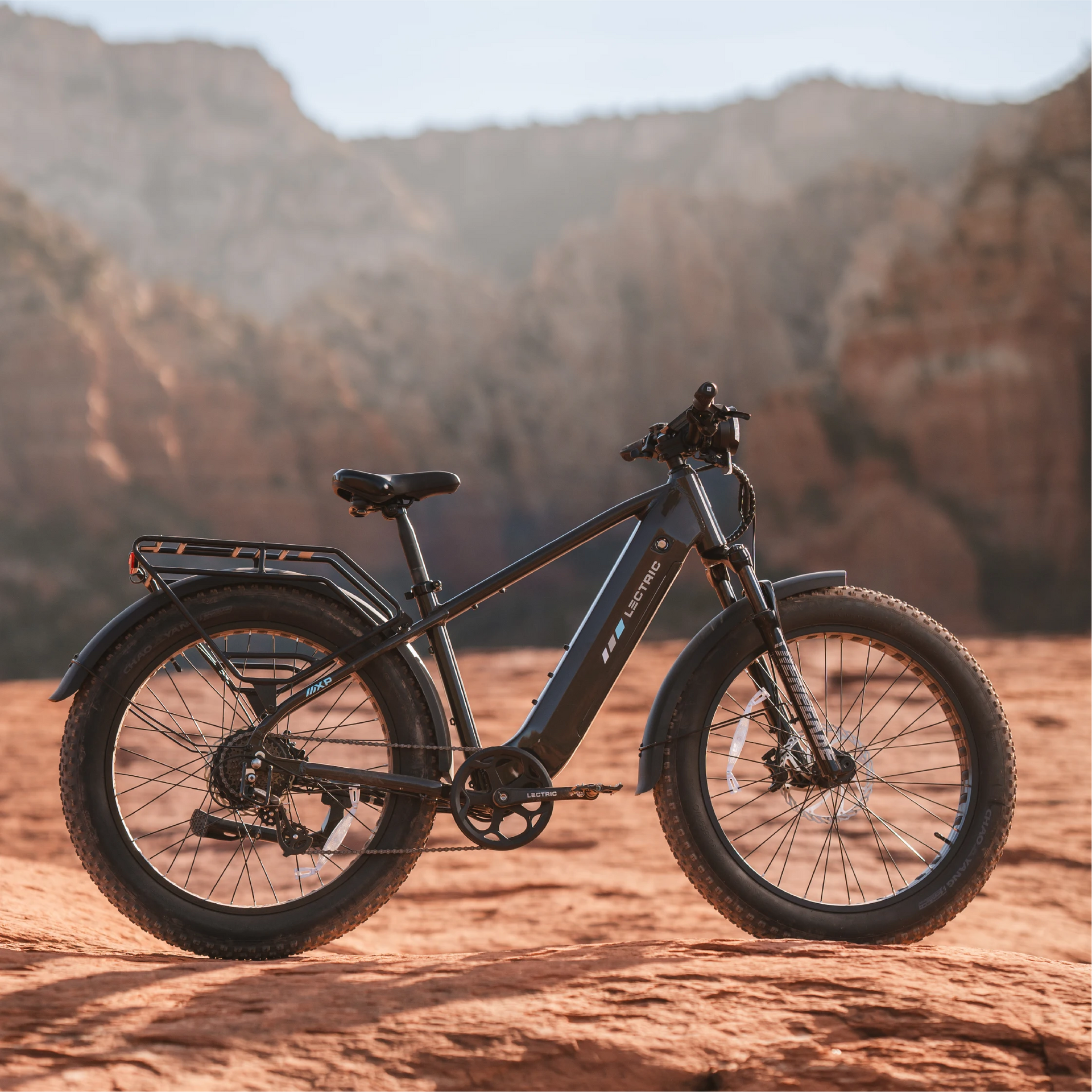 XPeak2 High-Step Long-Range + FREE Rear Rack, Fenders, Elite Headlight, Suspension Seat Post, Bike Lock, Phone Mount, Fast Charger ($583 Value)